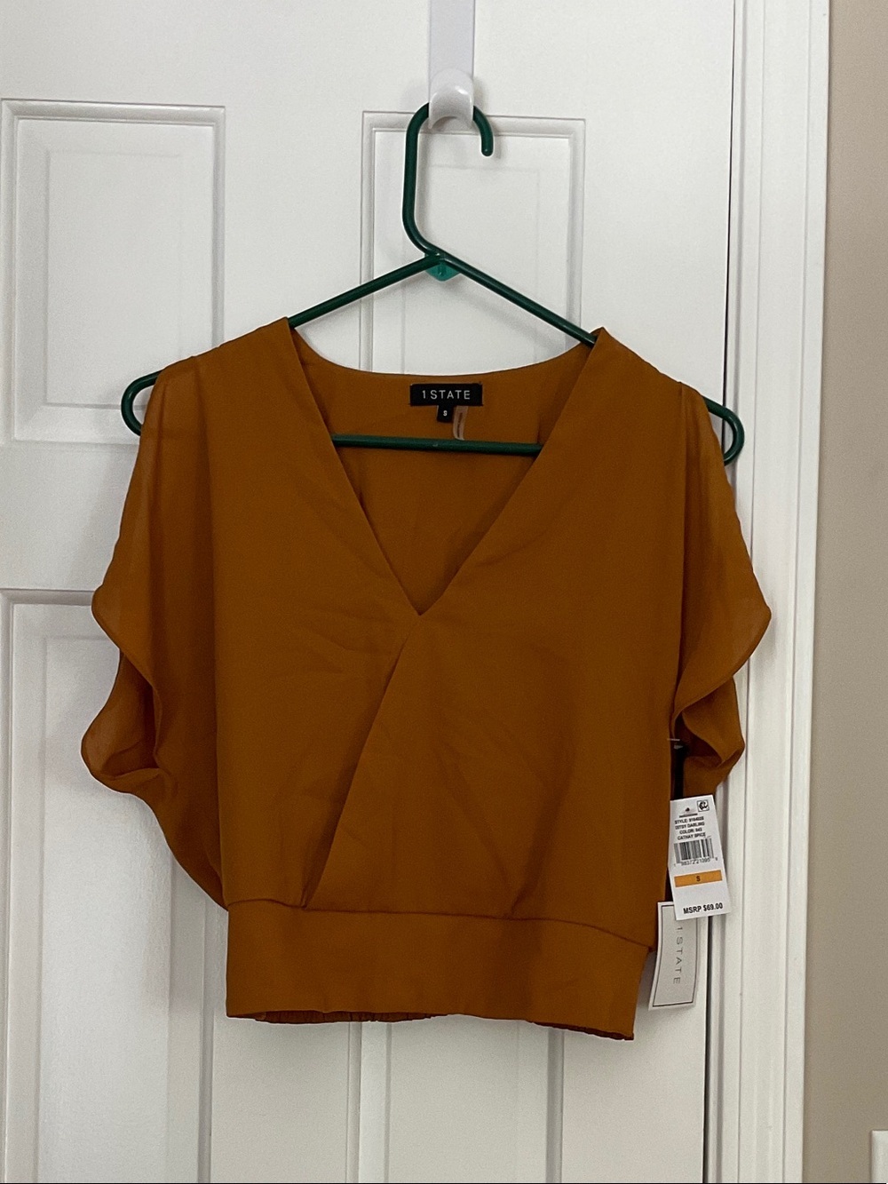 1. State Rust Orange V-Neck Flutter Sleeve Blouse
